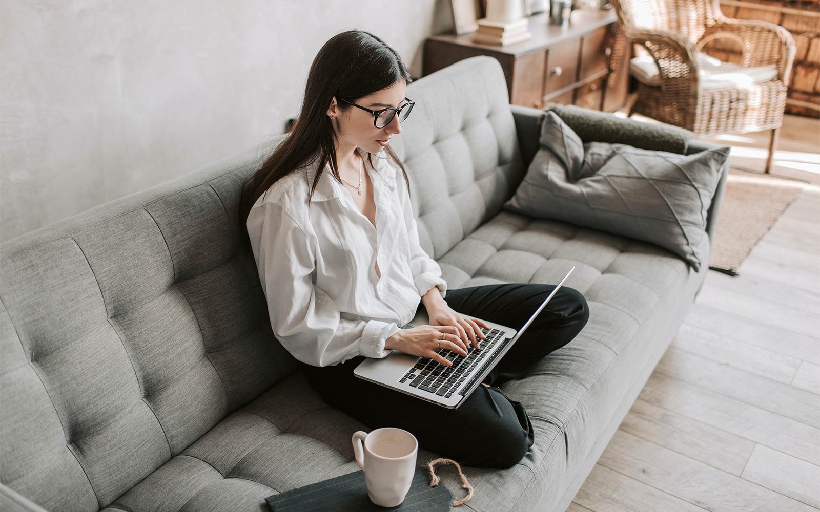 Woman Working on Couch Woman Working on Couch